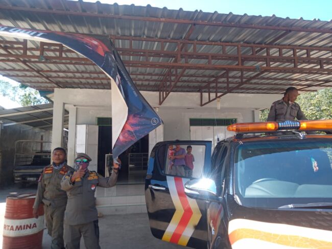 Malaka Penertiban baner iklan rokok